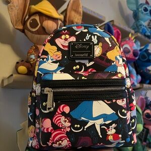 NEW WITH TAGS Loungefly Disney Alice In Wonderland Mini Backpack!!!